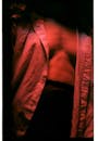 Womans Chest in Red Light