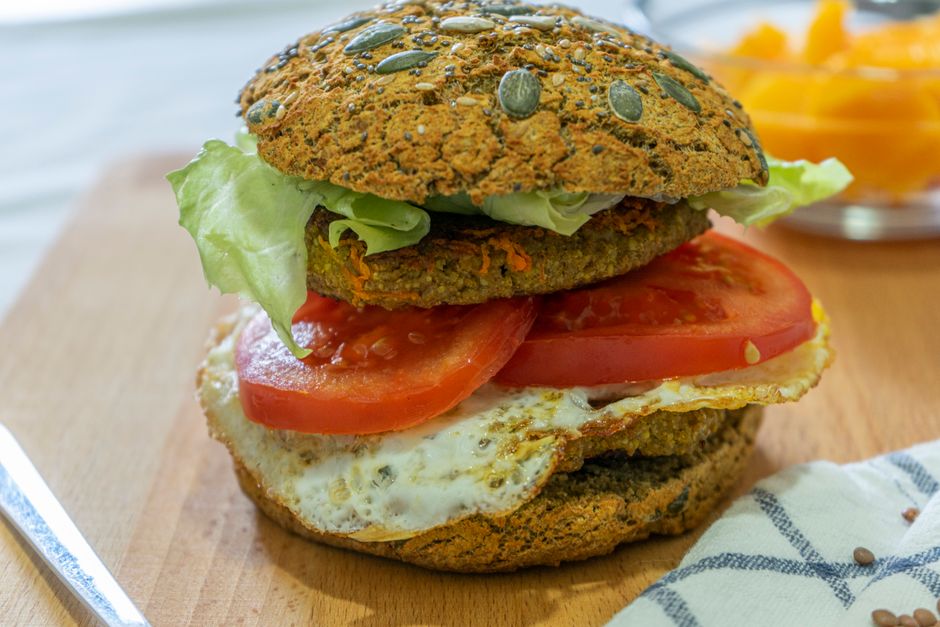 a simple 4-ingredient vegan bean burger served on a toasted bun with lettuce - easy low cost vegan a simple 4-ingredient vegan bean burger served on a toasted bun with lettuce - easy low cost vegan