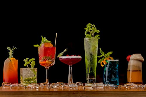 A Selection of Cocktail Drinks in a Variety of Glasses