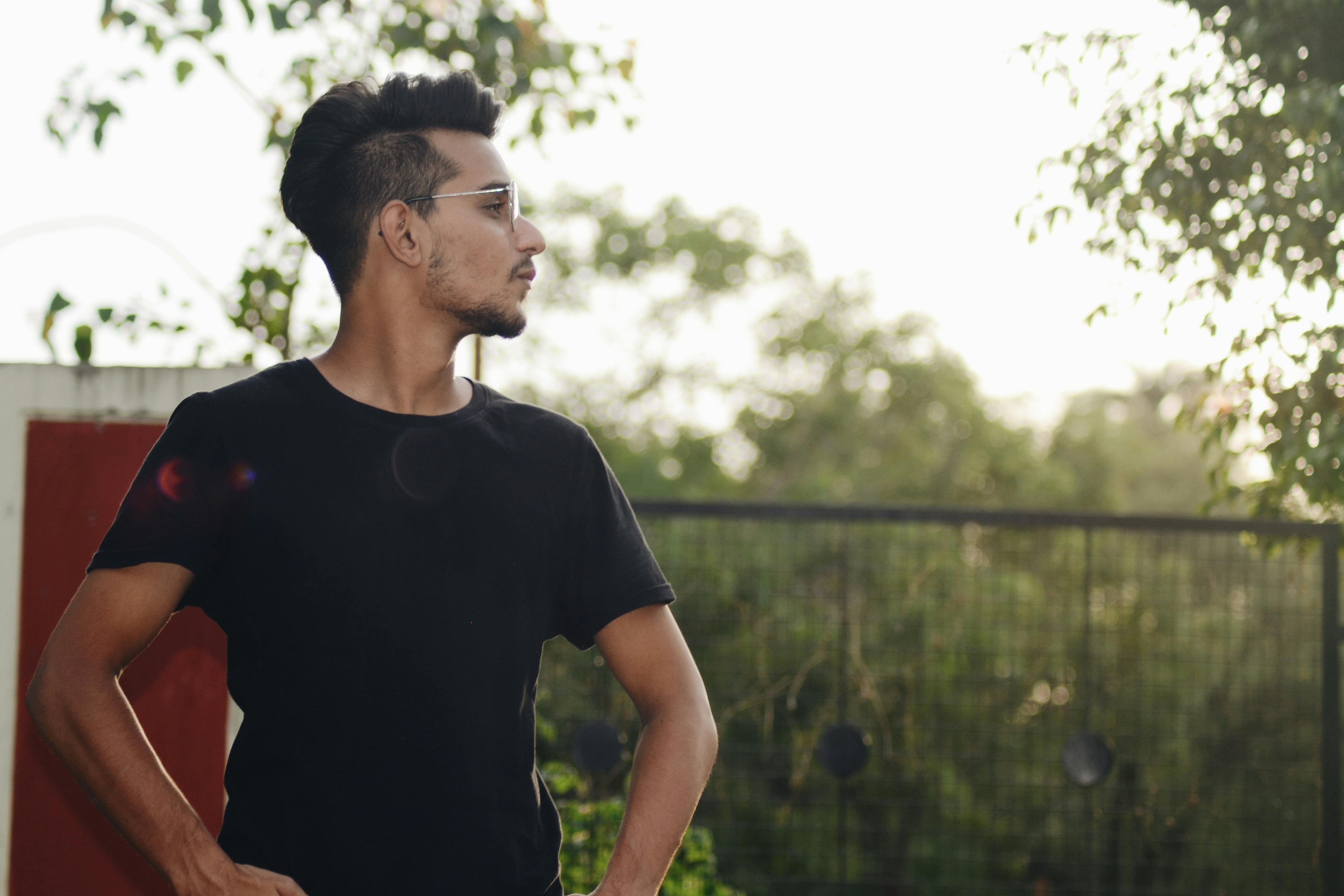 Man Near Green Leaf Tree at Daytime