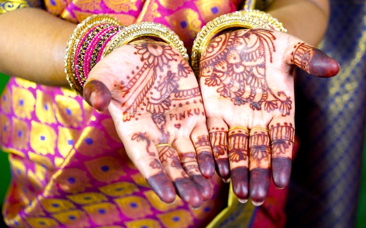 Hands With Mehndi Tattoo Design