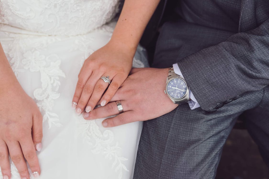 Free Husband and wife with ring and watch Stock Photo