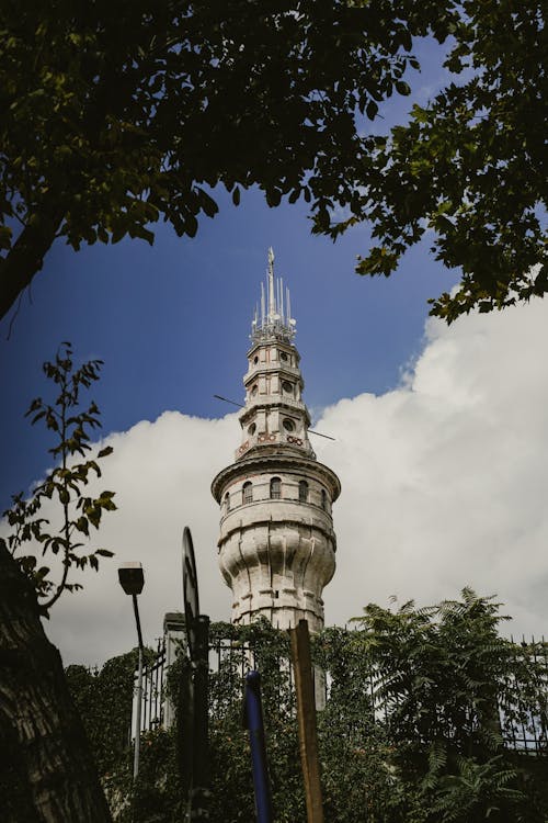 White Concrete Tower Under the Blue Sky