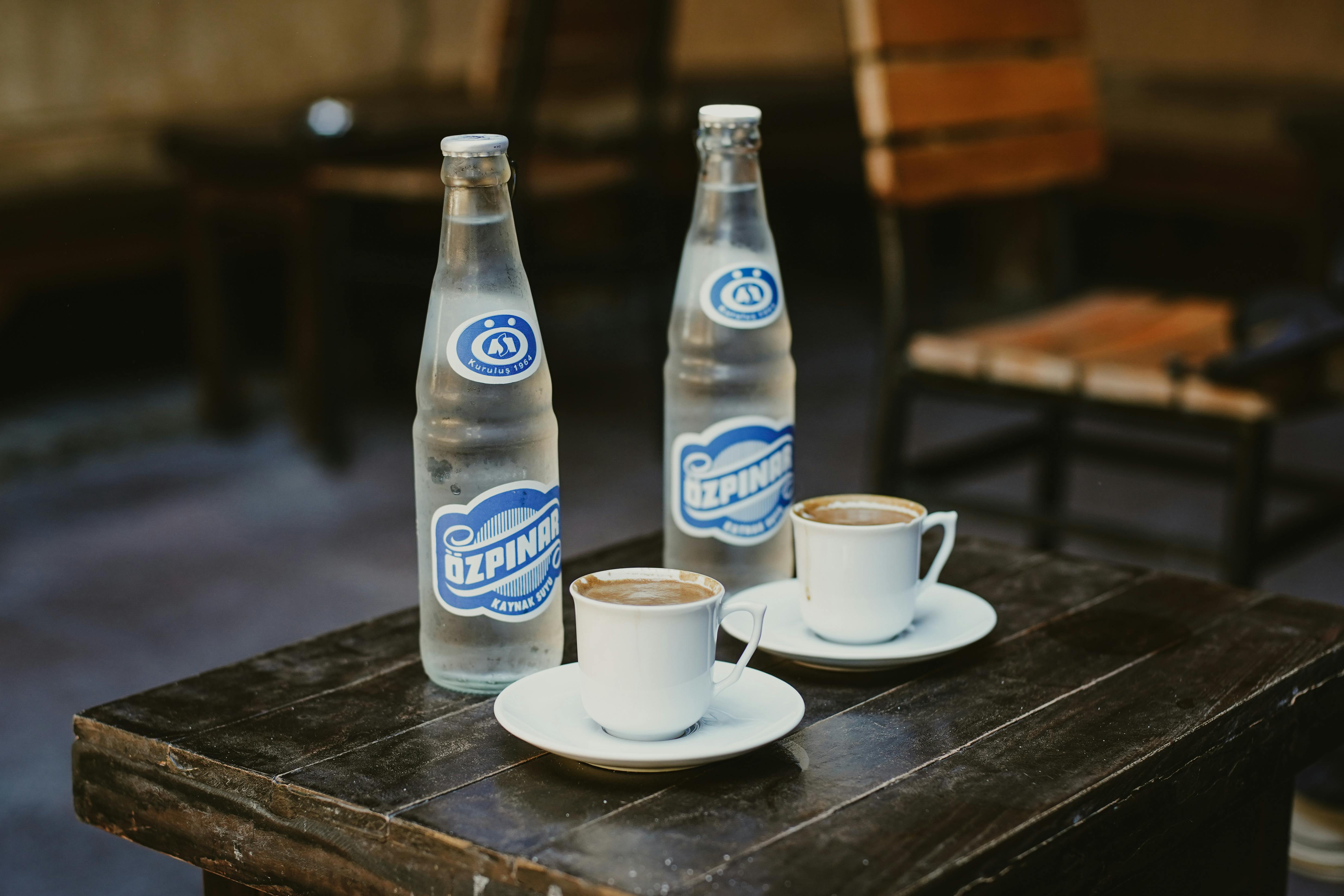 Hydration Scene With Water Bottles And Coffee Cups