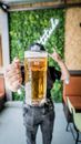 Person Holding Clear Drinking Glass With Beer
