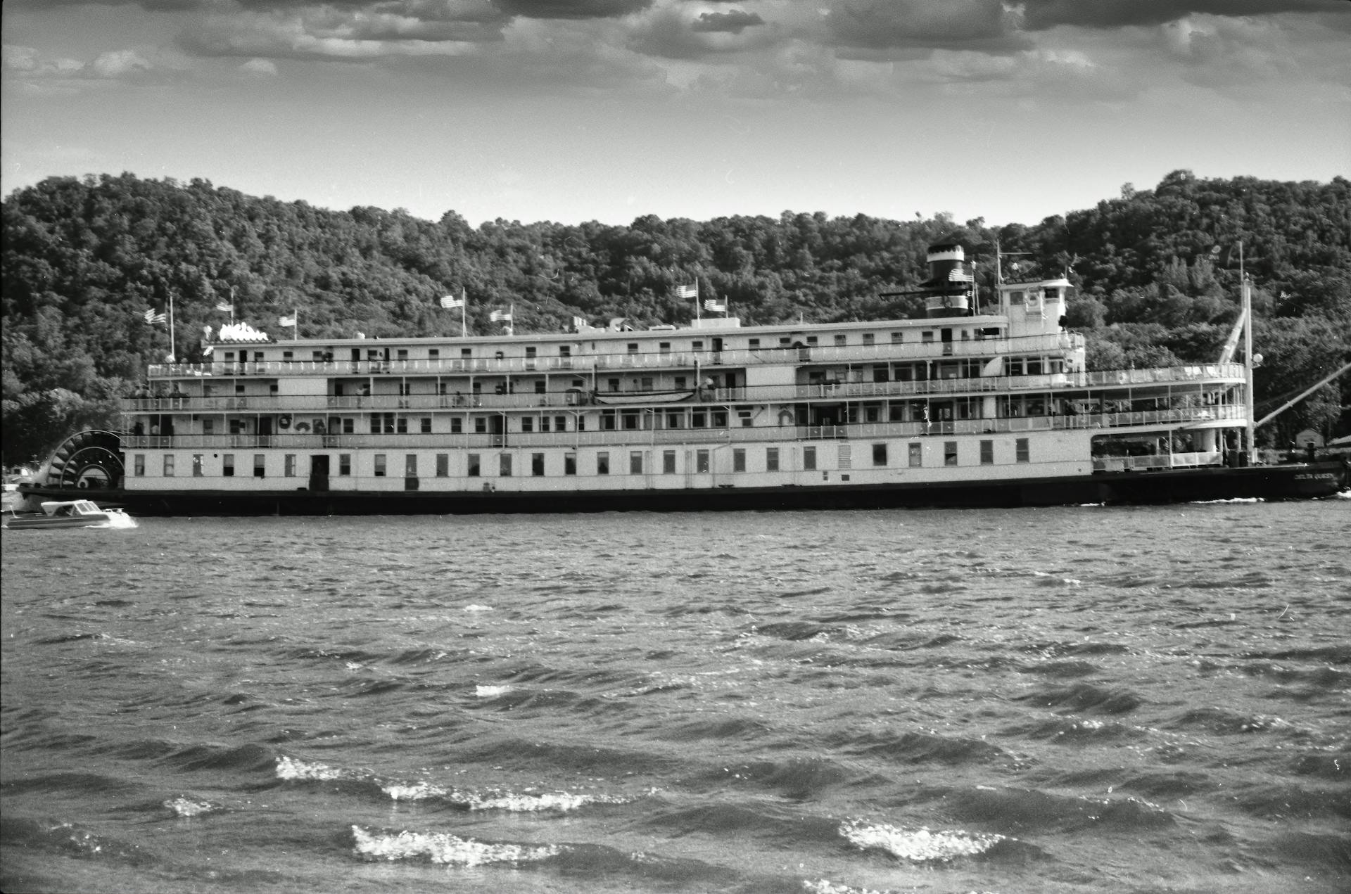 A black and white image of a historic paddle steamer cruising the Mississippi River near Wabasha, Minnesota.