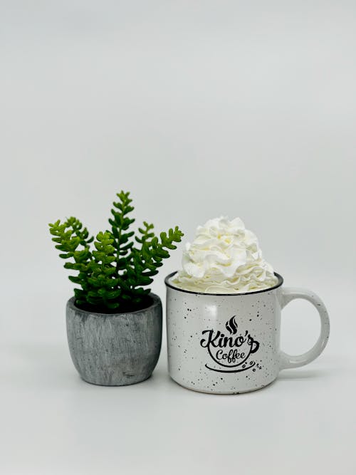 White Cream on White Ceramic Cup