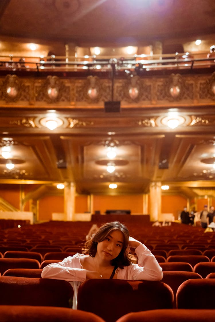 Woman In Empty Theatre