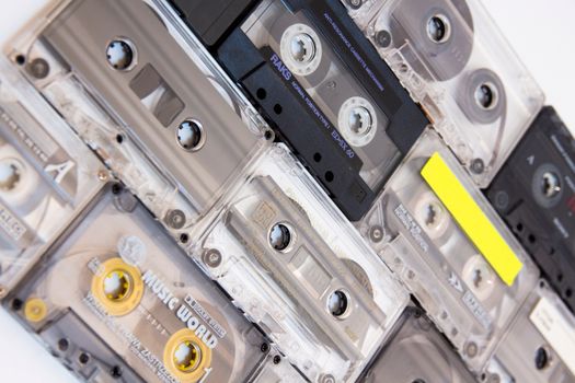A nostalgic flat lay of vintage audio cassettes showcasing retro music vibes.