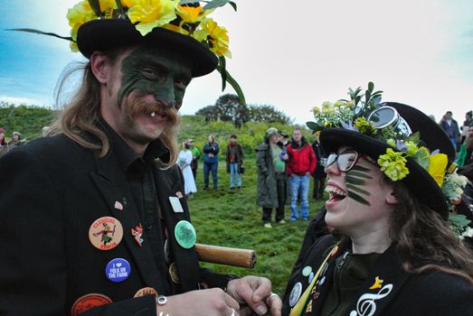Man and Woman Wearing Black Hat