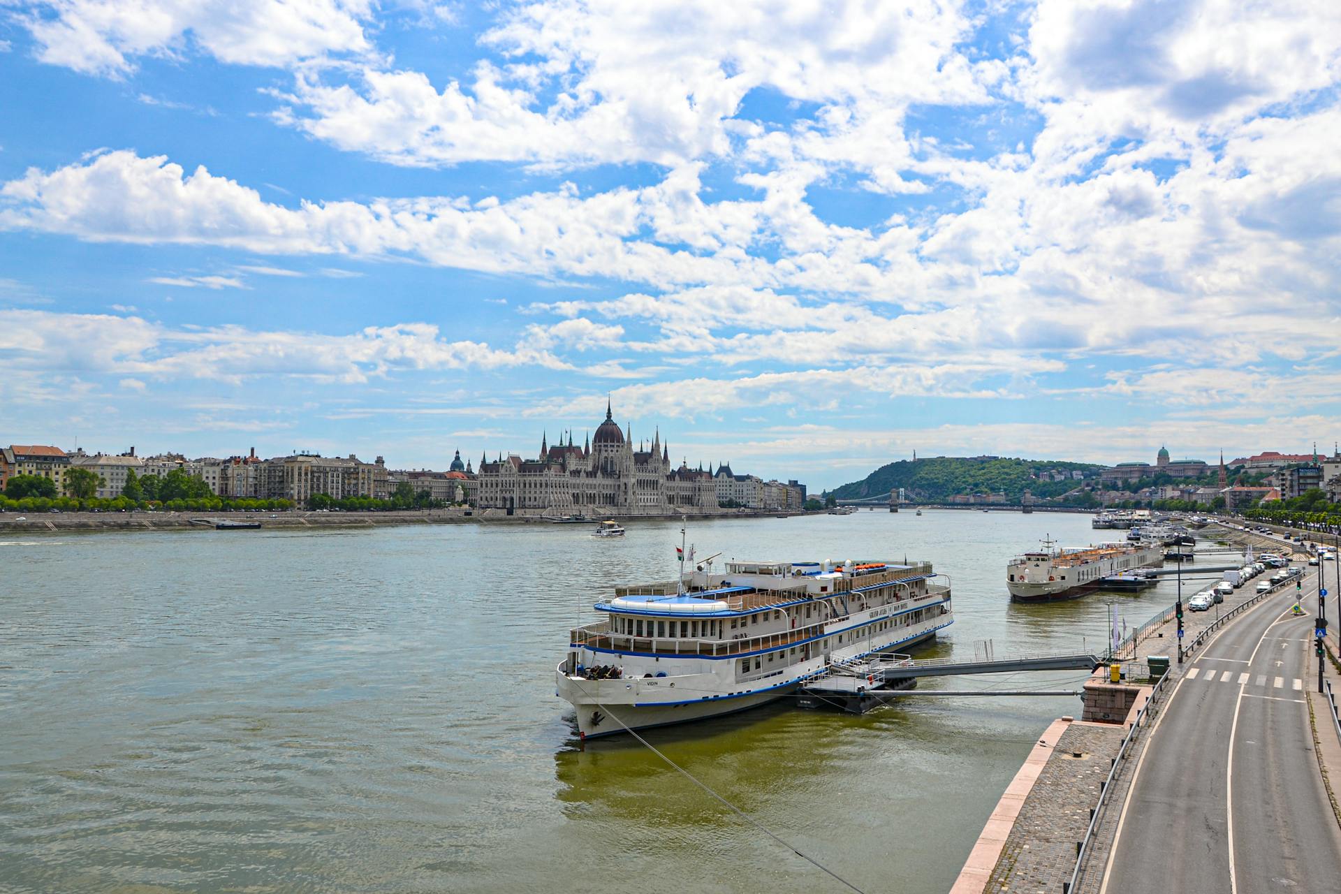 Cruise Ships on River in City
