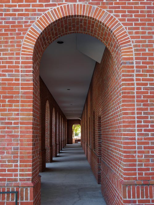 Free An  Arch Made out of Red Bricks Stock Photo