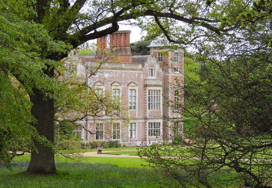 Historic estate surrounded by lush greenery