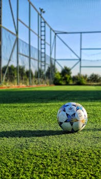 Vibrant photo of a soccer ball on an outdoor field in Istanbul, Turkey.