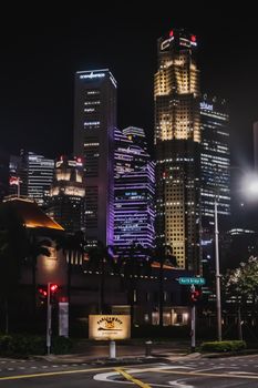 Stunning night view of Singapore's illuminated skyscrapers and city skyline.