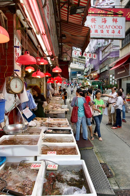 Free People Walking in Fish Market Stock Photo