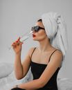 Woman in Black Tank Top Wearing Black Sunglasses