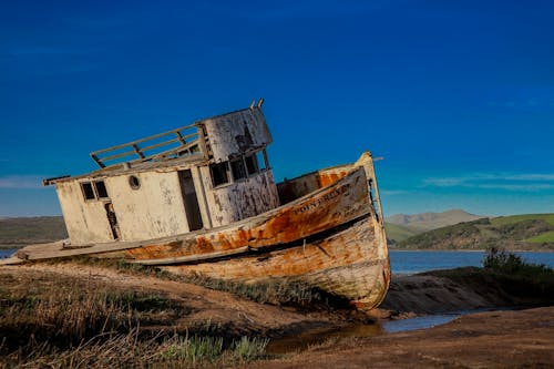 Photos gratuites de abandonné, baie, bateau