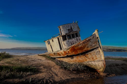 Photos gratuites de abandonné, baie, bateau