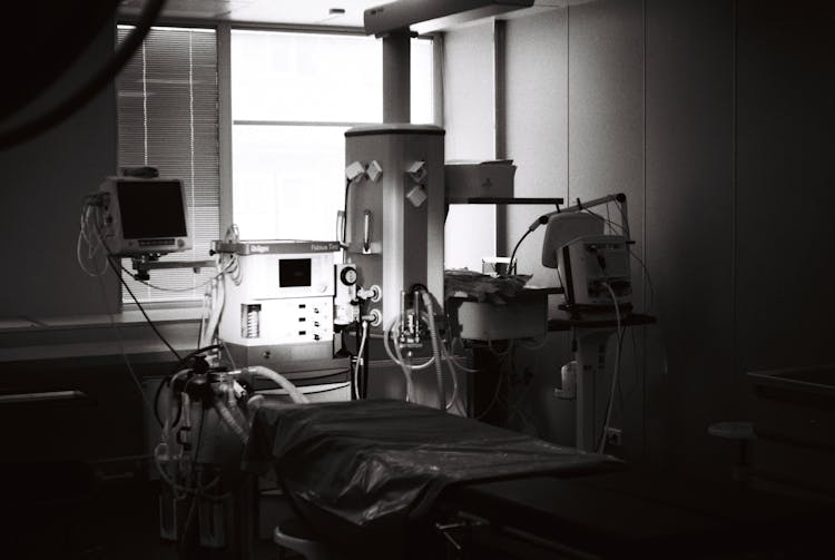 Black And White Photo Of A Hospital Bed 