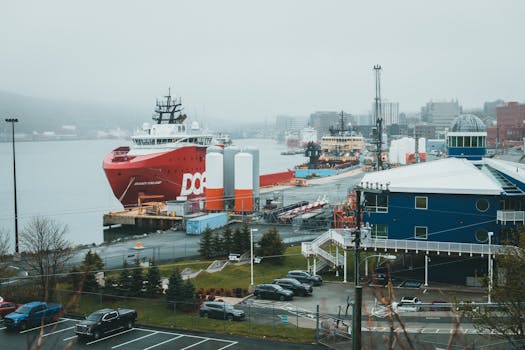 A vibrant port scene featuring large cargo ships docked near urban buildings.