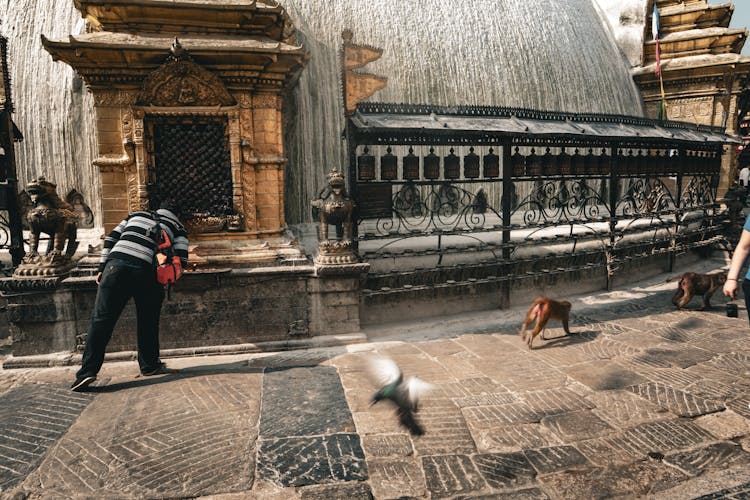 People Near Old Traditional Temple