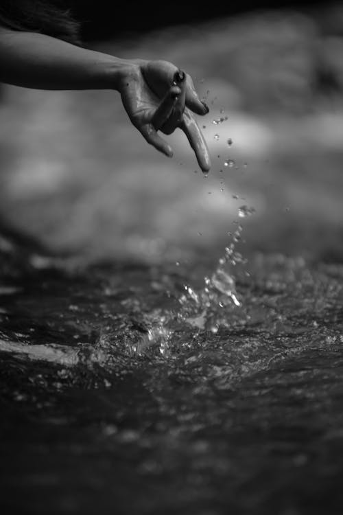 Hand and Splashing Water