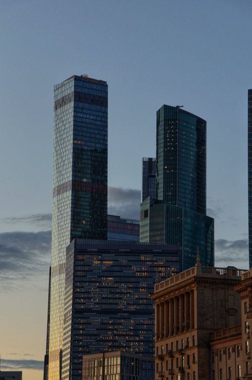 Free Modern skyscrapers in Moscow's skyline at twilight, showcasing urban architecture. Stock Photo