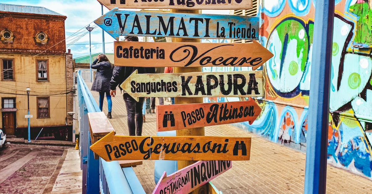 Colorful Wooden Signage Pointing Directions · Free Stock Photo