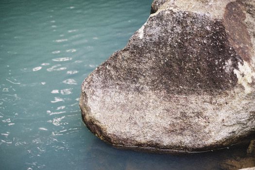 Photo of a Rock in Water 