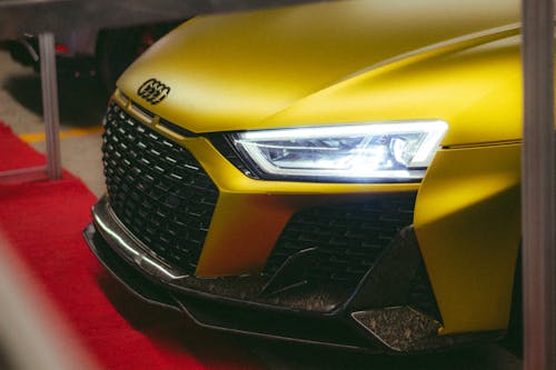 Headlight of a Yellow Audi Car