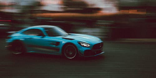 Blurred Motion of a Blue Mercedes-AMG GT