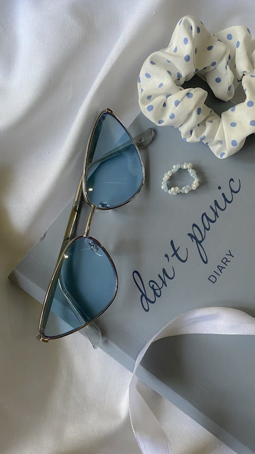 Close up of Sunglasses on a Diary