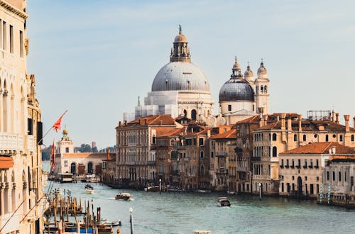 Free Buildings Along a Canal in Venice, Italy Stock Photo