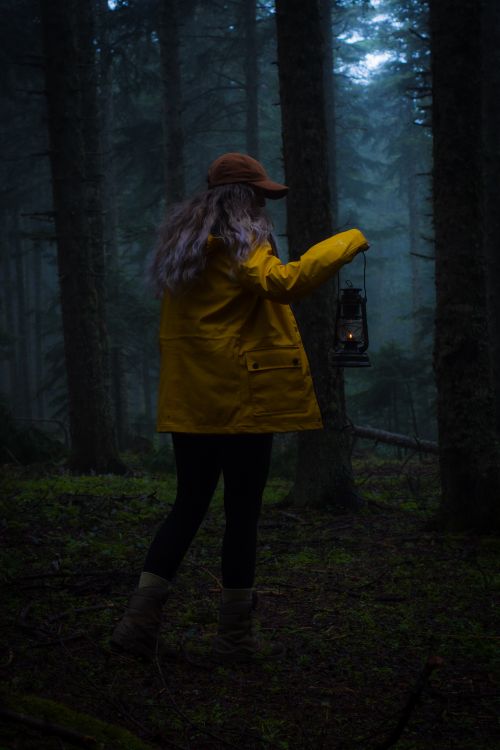 Woman in Yellow Coat Standing in the Forest · Free Stock Photo