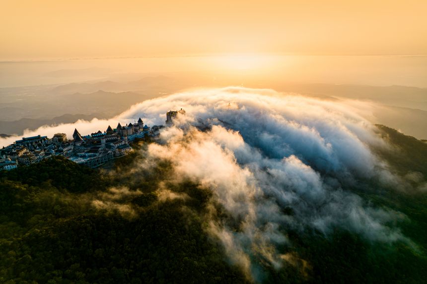 Golden sunrise over a mountaintop village — Ba Uoc Phung on Pexels
