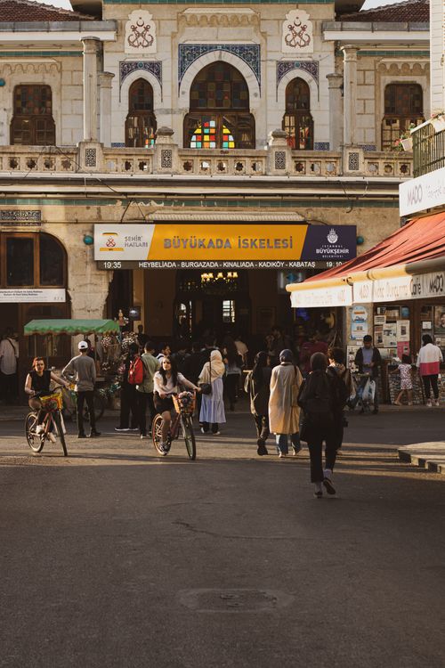 Free A bustling scene at Büyükada Ferry Terminal in Istanbul, showcasing local architecture and vibrant street life. Stock Photo