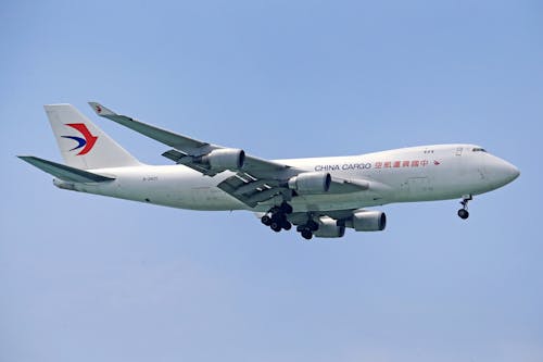 White Airplane in the Blue Sky