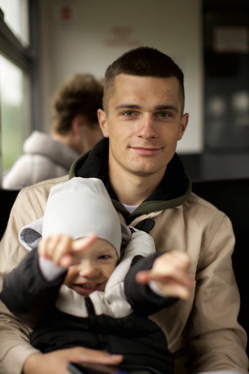 Free A Man Carrying His Child Stock Photo