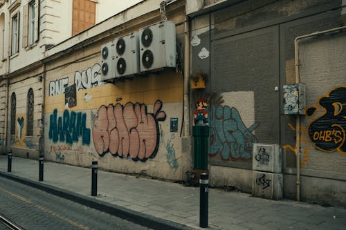 Бесплатное стоковое фото с вандализм, граффити, рисунки на стенах