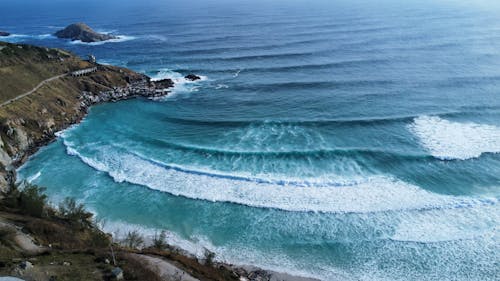 Sea Foam Floating on the Blue Ocean 