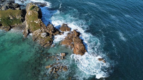 Drone Shot of Sea Waves Crashing on Rocks