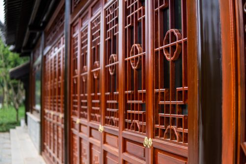 Free Close-up of a traditional Chinese wooden pavilion facade showcasing intricate designs and patterns. Stock Photo