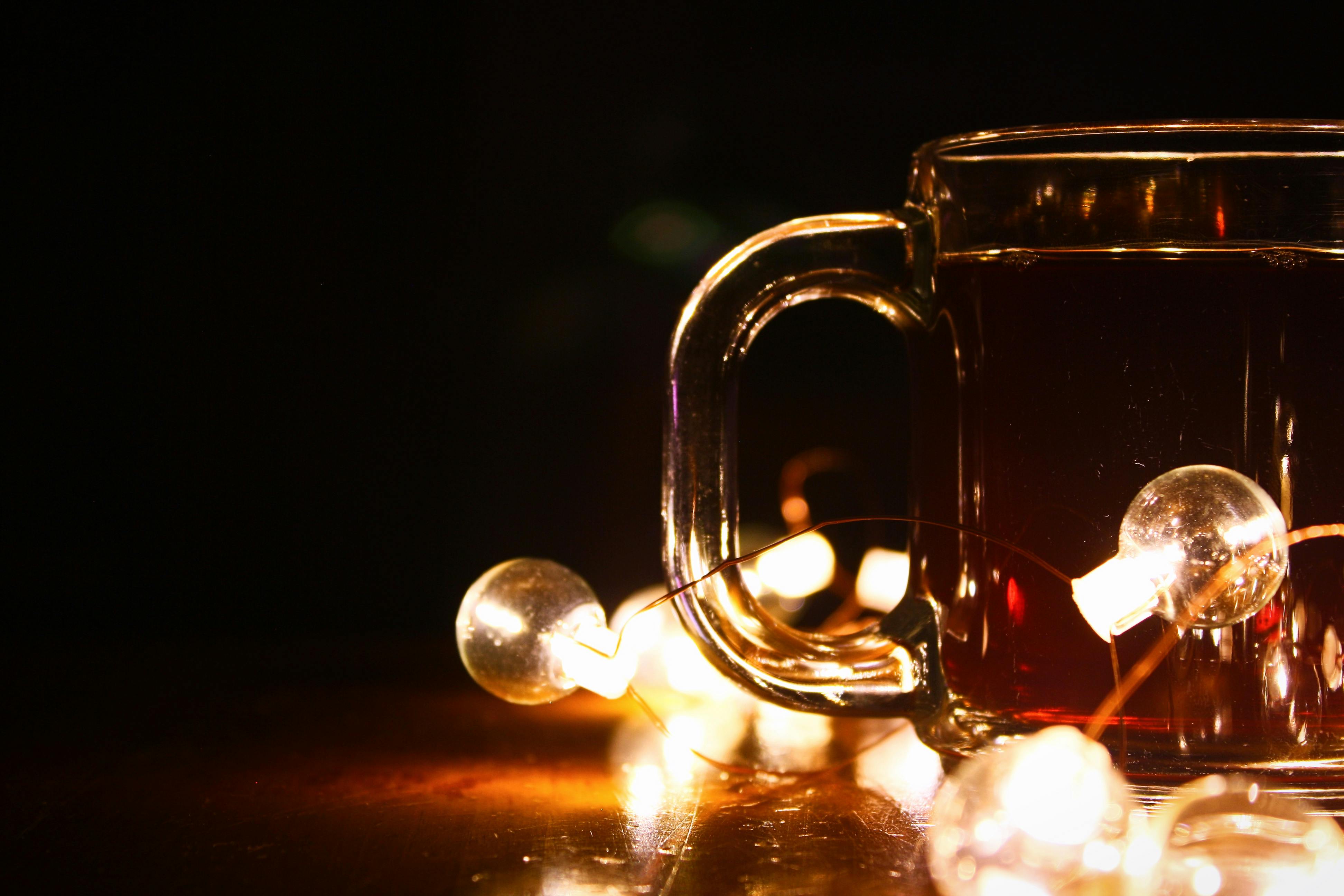 led bulbs near a glass mug