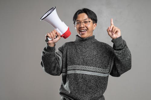 Man Holding a Megaphone