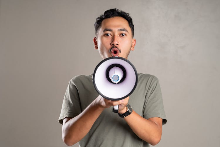 Man Shouting On A Megaphone 