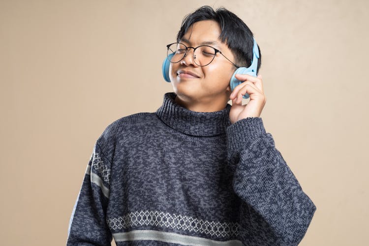 Young Man Listening To Music