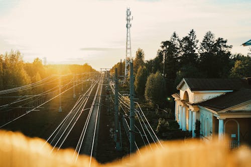 Foto profissional grátis de estrada de ferro, faixas, luz do sol
