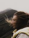 Woman Face and Mountains in Background