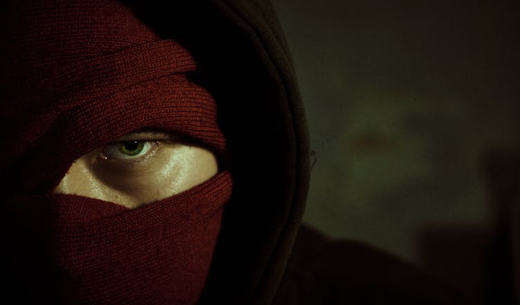 Close Up Of A Person Wearing A Mask